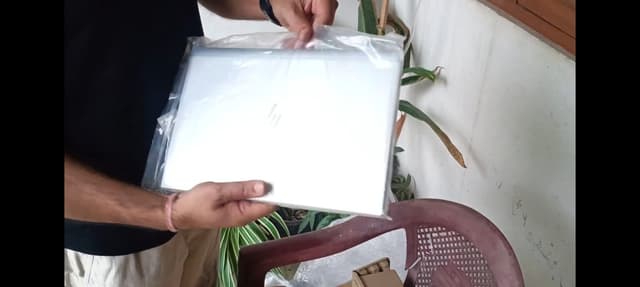 jogendra kumar with laptop in his hand